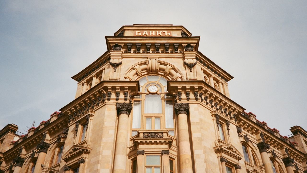 Ornate bank facade in Moscow featuring columns, windows, and architectural details.