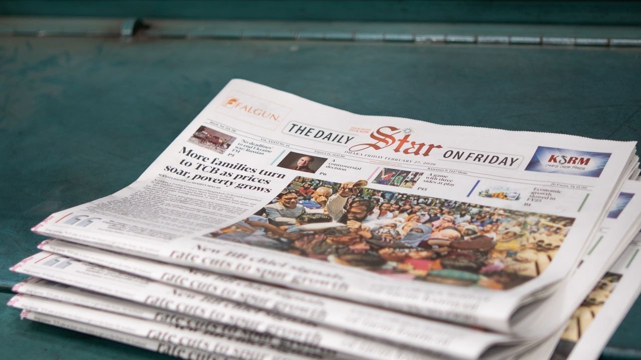 Stack of 'The Daily Star' newspapers showcasing a headline on rising poverty and price issues.