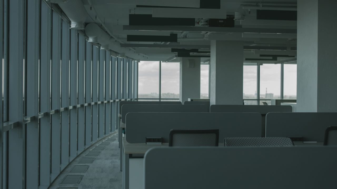 Empty office interior with modern design and large windows. Ideal for business concepts.
